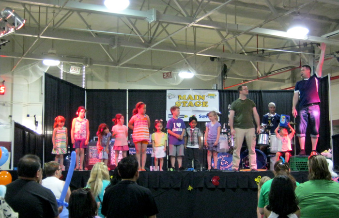 Jonny shows them a dance move.