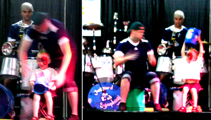 Cheerleader holds up the Cheer Box.