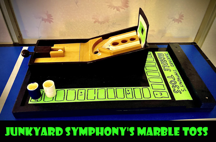 Junkyard Symphony's Marble Toss