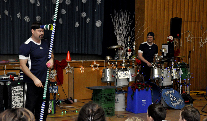 Junkyard Jonny celebrates. Marvelous Mark plays a beat.