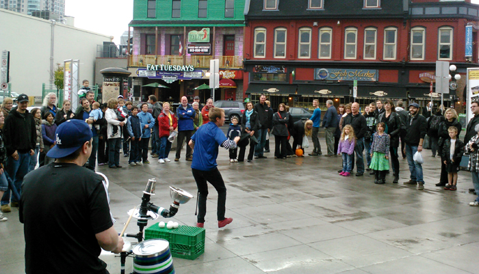 Juggling Joe addresses the crowd.